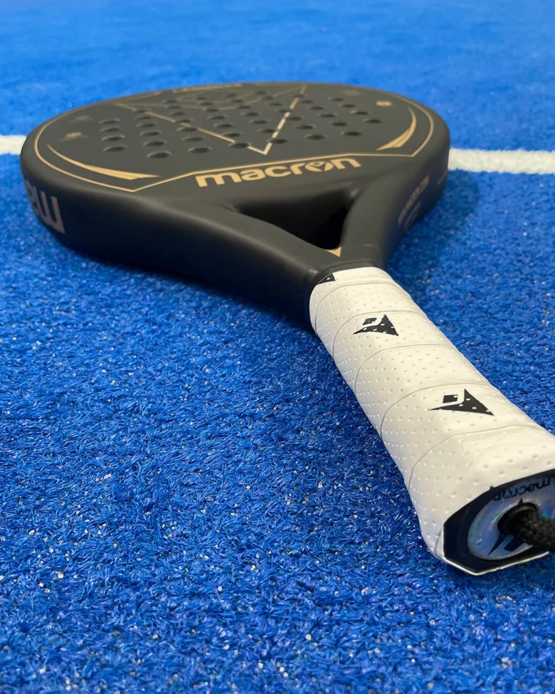 Padel racket on court