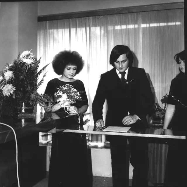 Wedding couple signing register