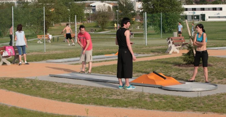 People playing minigolf