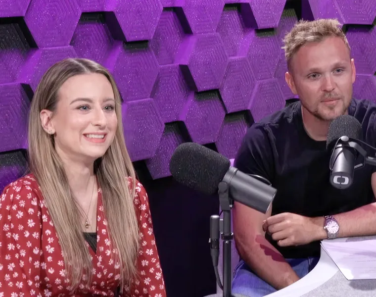 Two people at microphones