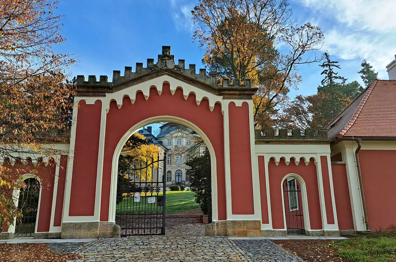 Red gate and manor house