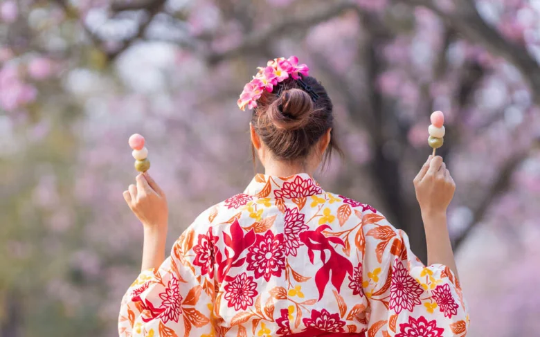 Woman in kimono with dango