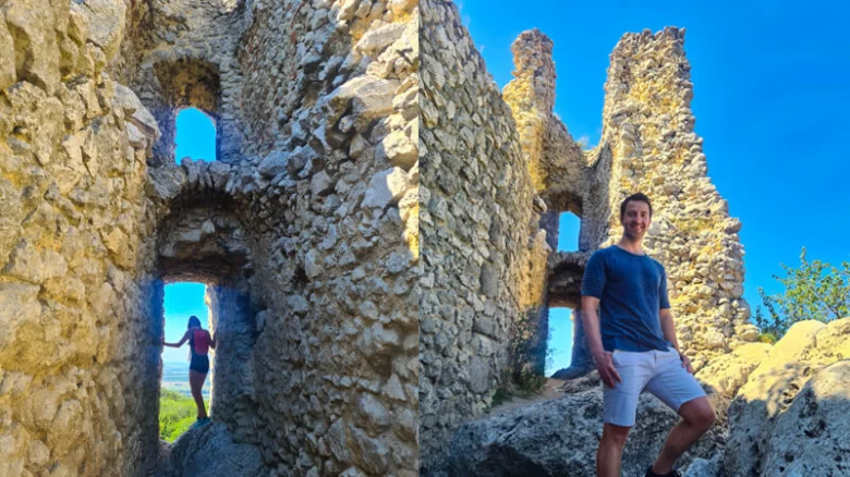 Stone ruins with people posing
